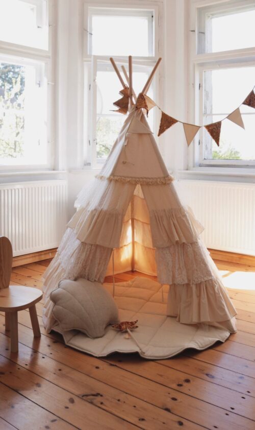 white tipi with frills