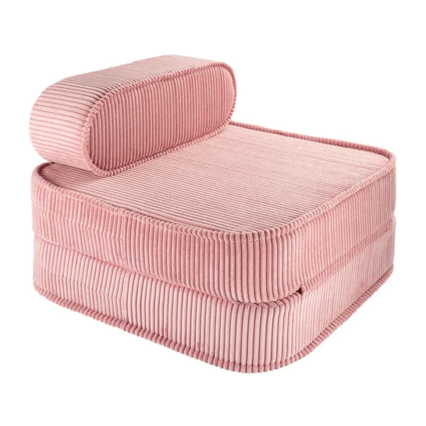 różowy fotel rozkładany sztruksowy
